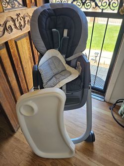 Like New (Used 3X at Grandma's House). Graco 6 and 1 Deluxe Highchair. Clean. No Stains.