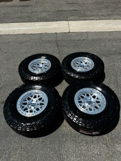 KMC KM549 GRS 6x5.5 Wheels with 35” Nitto Ridge Grappler Tires Machined