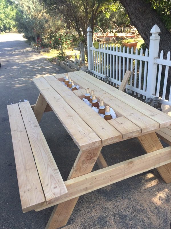 Picnic table with middle cooler