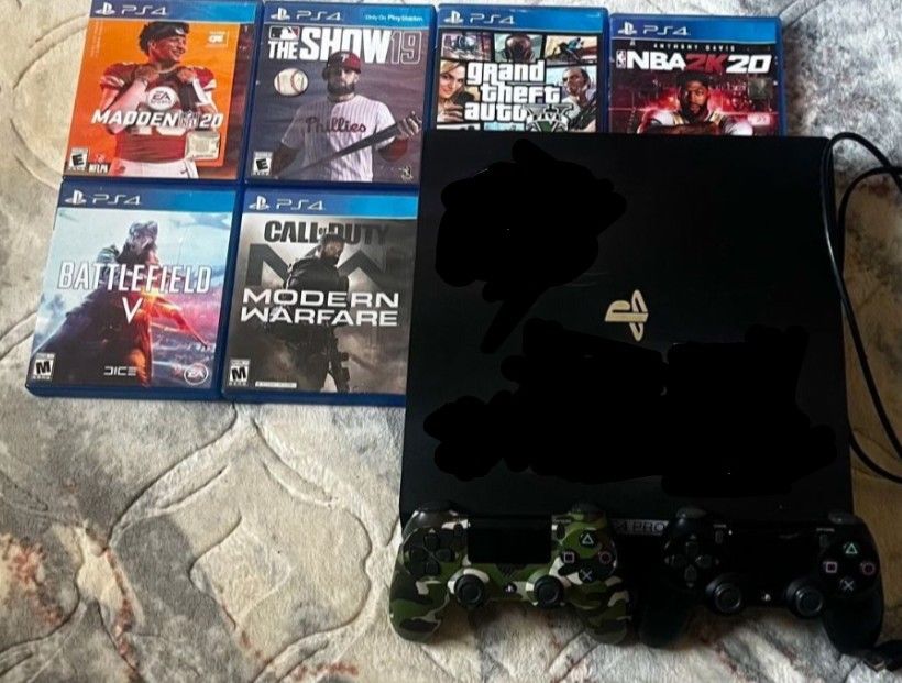 PS4 Pro w/ New Thermal Paste, 4 Controllers (2 Brand New) and New Power supply and games.