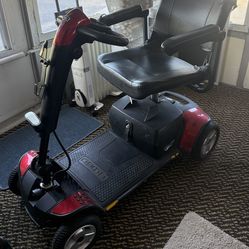 Motorized scooter. Full size. Battery and battery charger are brand new. Runs excellently.