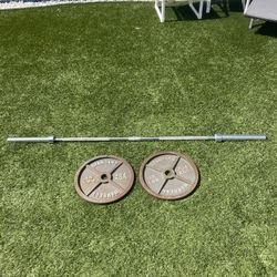 Barbell And 2 45lbs Plates