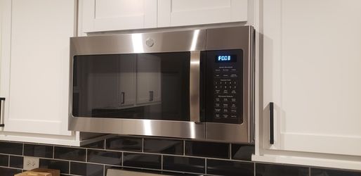 GE® 1.9 Cu. Ft. Over-the-Range Sensor Microwave Oven with Recirculating Venting