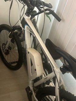 Two bikes , one e-bike and one BMX