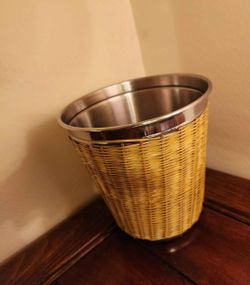 Wicker and Stainless Steel ice basket.