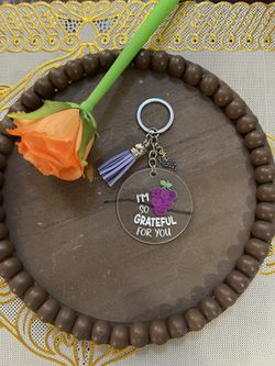 Cute Keychain and Purple Tassel