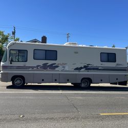 1997 RV MOTORHOME BY FLEETWOOD