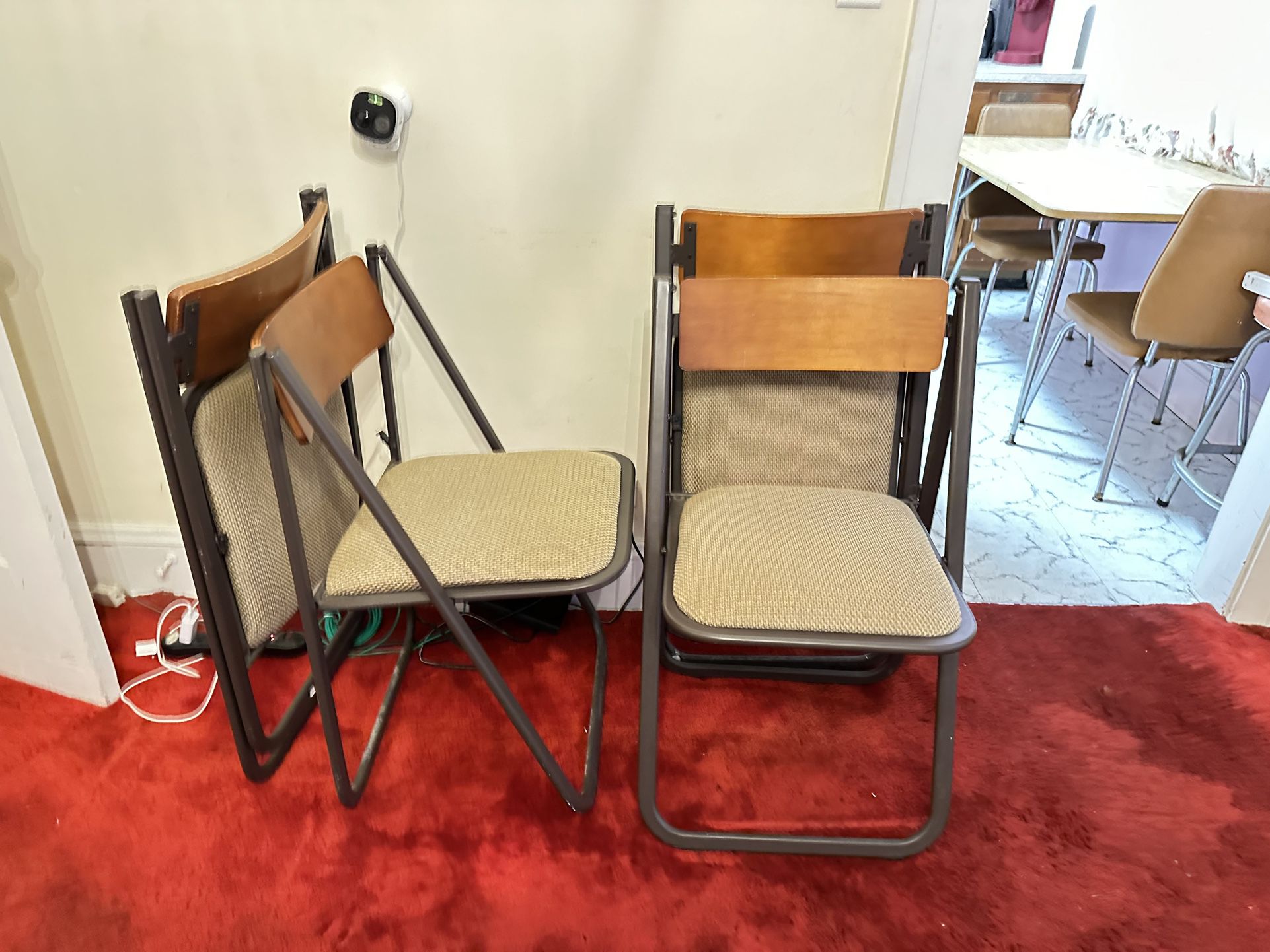 4 Sturdy Folding Chairs 