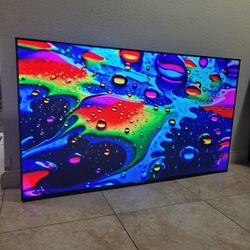 Like New 55" TCL Google UHD 4k Smart Frame Less TV WITH REMOTE 
