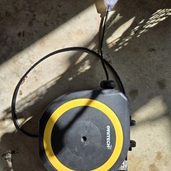 Used retractable ovitech extension cord