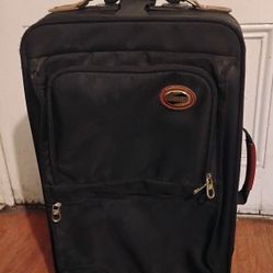 Carry on suitcase luggage 22 in H by 13 In W by 7 in H