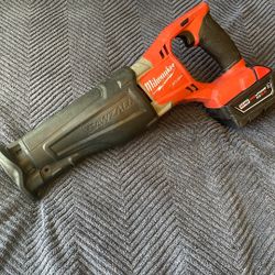 Milwaukee Fuel Saw And 5.0 Battery 