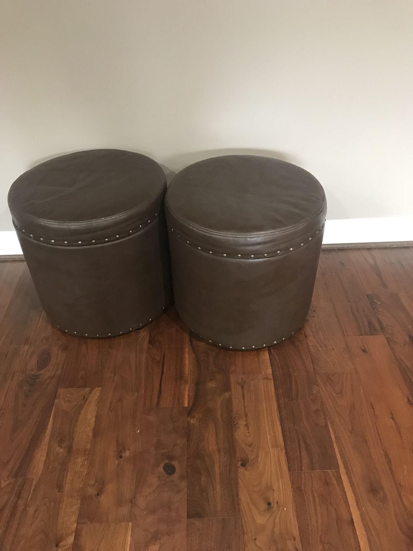 2 Leather storage Ottoman in excellent condition