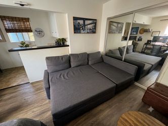 L-Shape Grey Pull Out Sofa