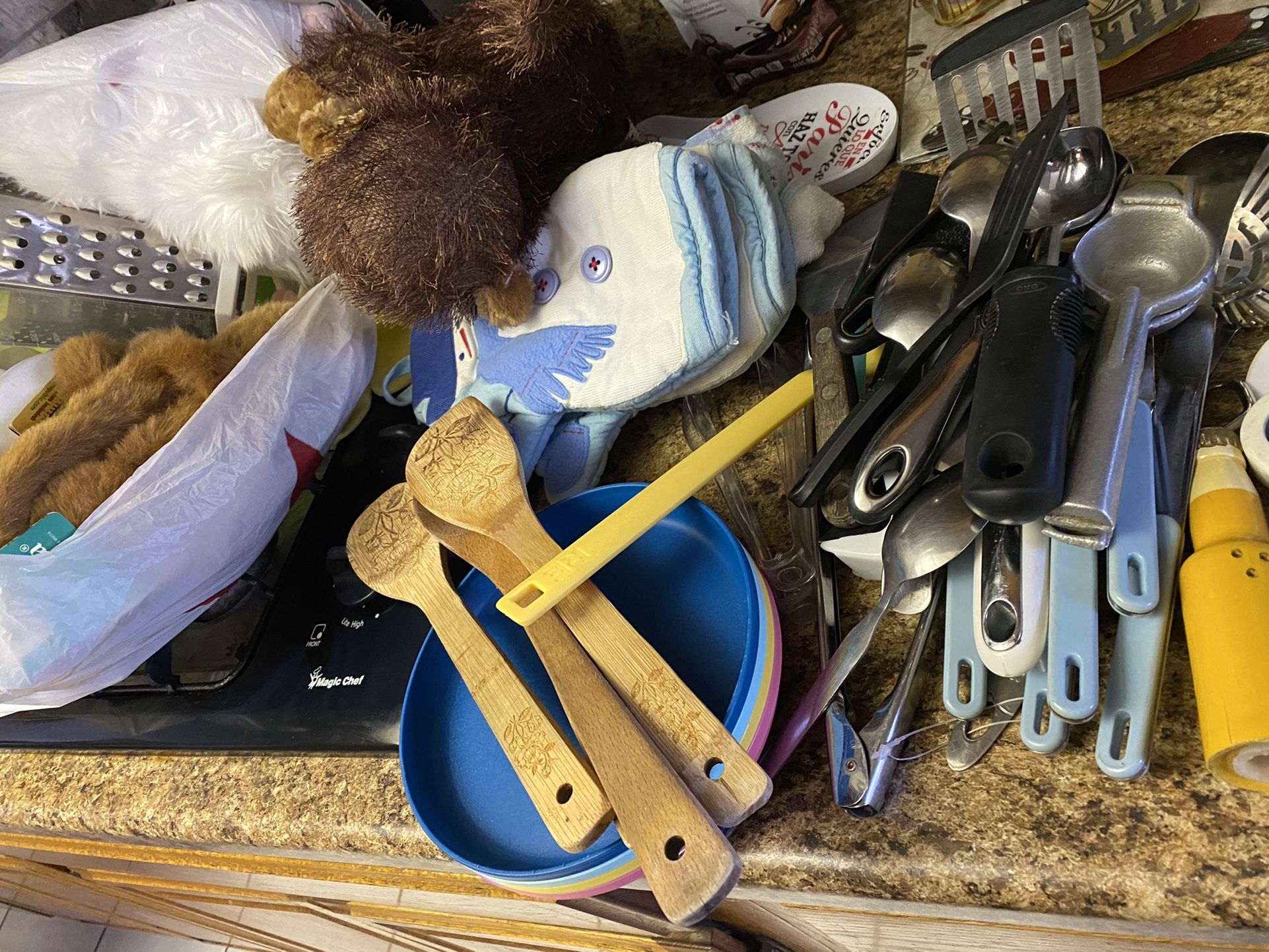 Utensils, Tuperwear, And Stuffed Animals