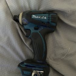 Makita 18V LXT Cordless Impact Driver, the DTD152Z model.