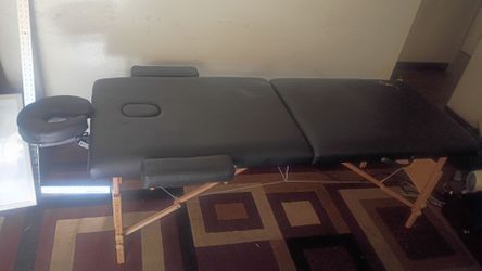 Massage table good condition small slight tare