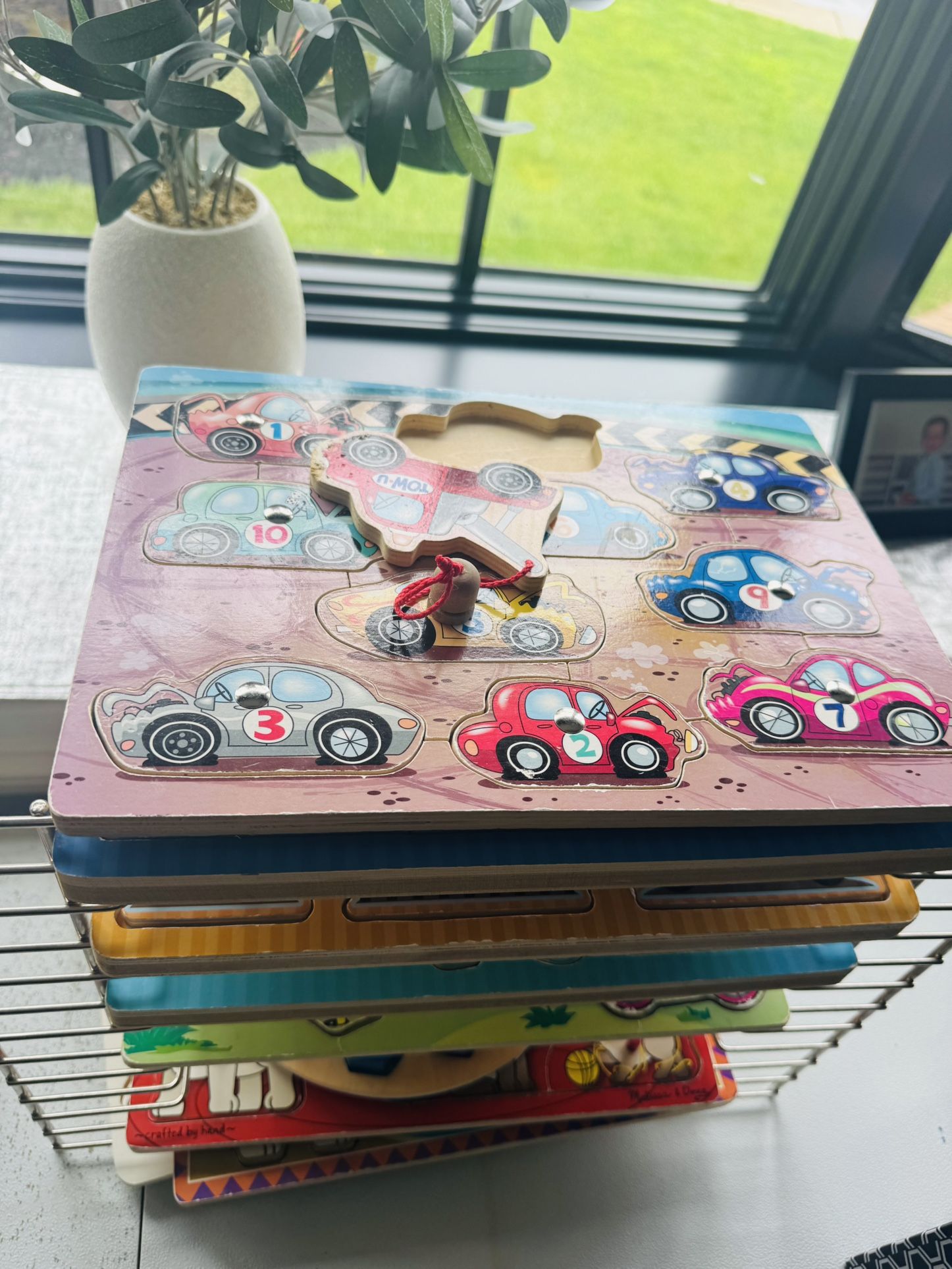 10 Puzzles and puzzle Holder