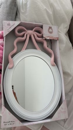 Bow wall mirror