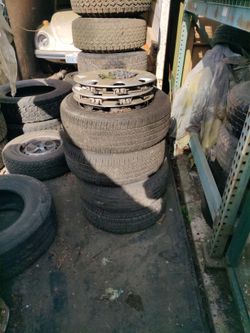 VW Beetle 4 Wheels, 3 Hubcaps & 4 Tires.