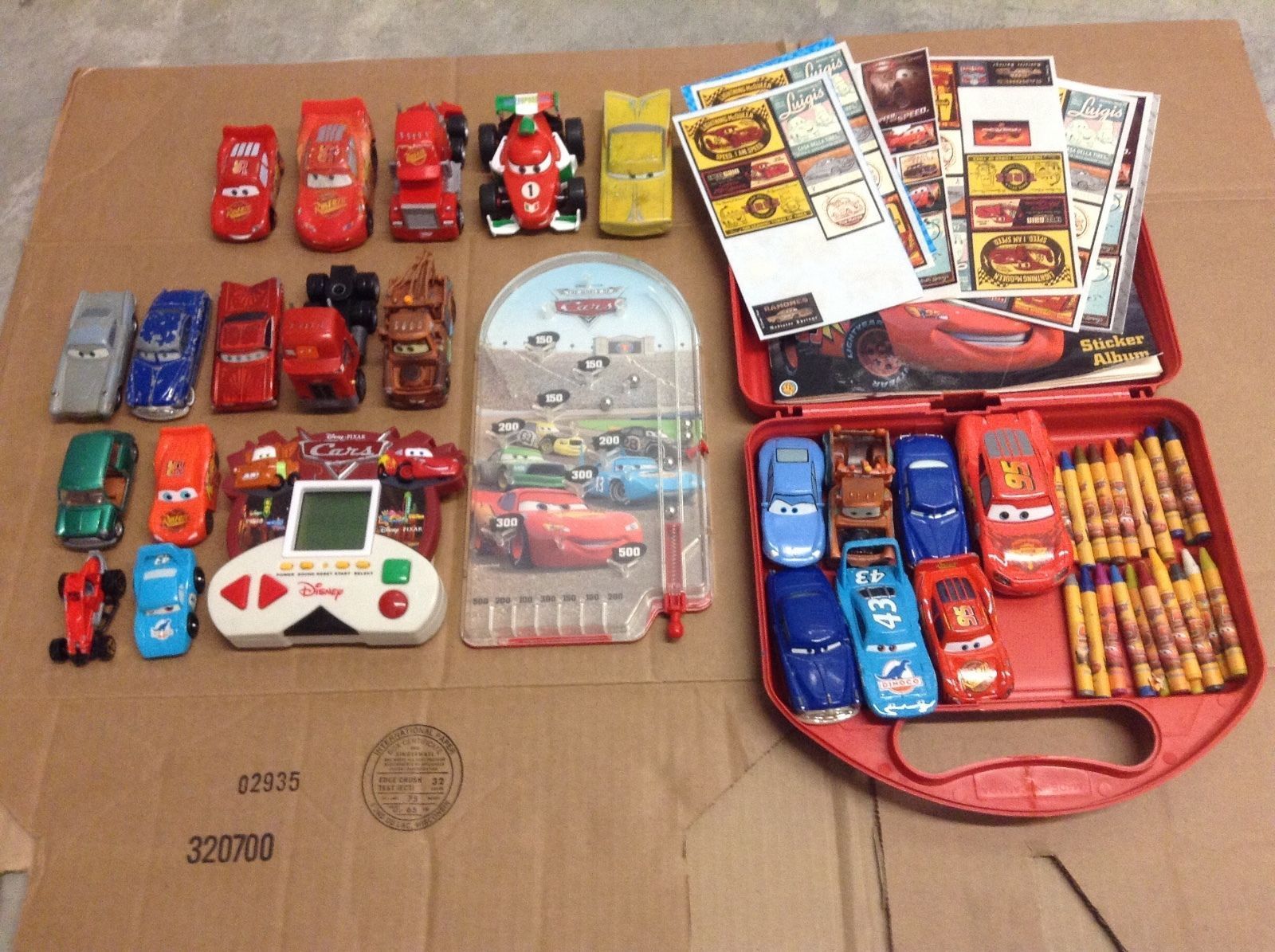 Disney Pesents A Pixar Cars Disney Pixar Cars Lot Cars Treasure Kit with Cars, Sticker Book, Stickers and Crayons