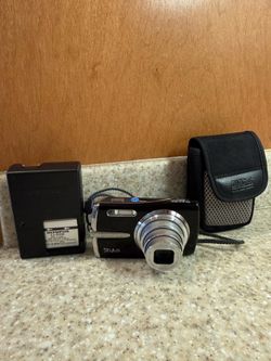 OLYMPUS Stylus 1010 10MP Digital Camera with 7x Optical Dual Image Stabilized Zoom (Black)