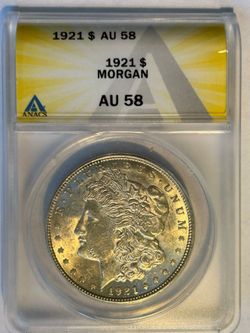 Morgan Silver Dollar Graded As An AU 58, 90% Silver.