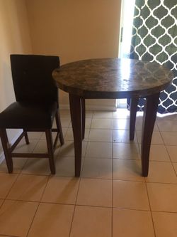 Table and one leather chair