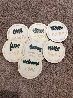 Baby month and hanger sign