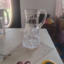 This item is an Antique American Brilliant Cut Glass (ABCG) Pitcher
