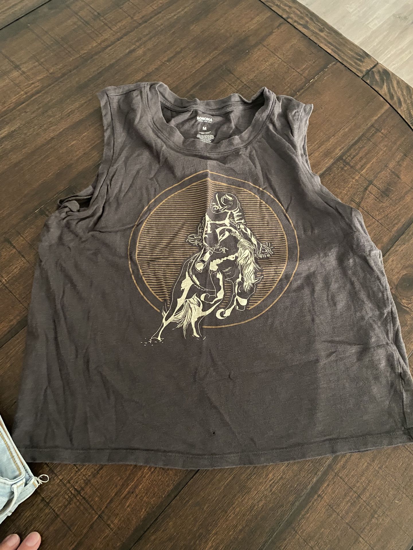 Women’s Size Medium Shirt (Small hole as wen in photo)