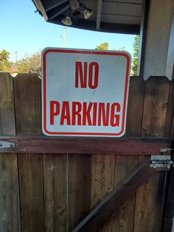 Metal No Parking sign