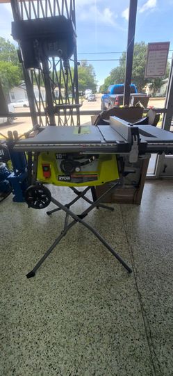 LIKE NEW RYOBI 10" ELECTRIC TABLESAW WITH EXTENDED TABLE AND ROLLING STAND 120$ LIKE NEW