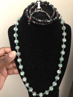 Green beaded necklace bracelet and earrings
