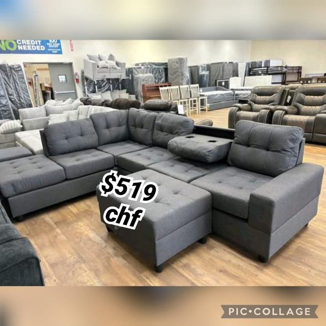 Fabric Reversible Sectional Sofa And Ottoman With Throw Pillows