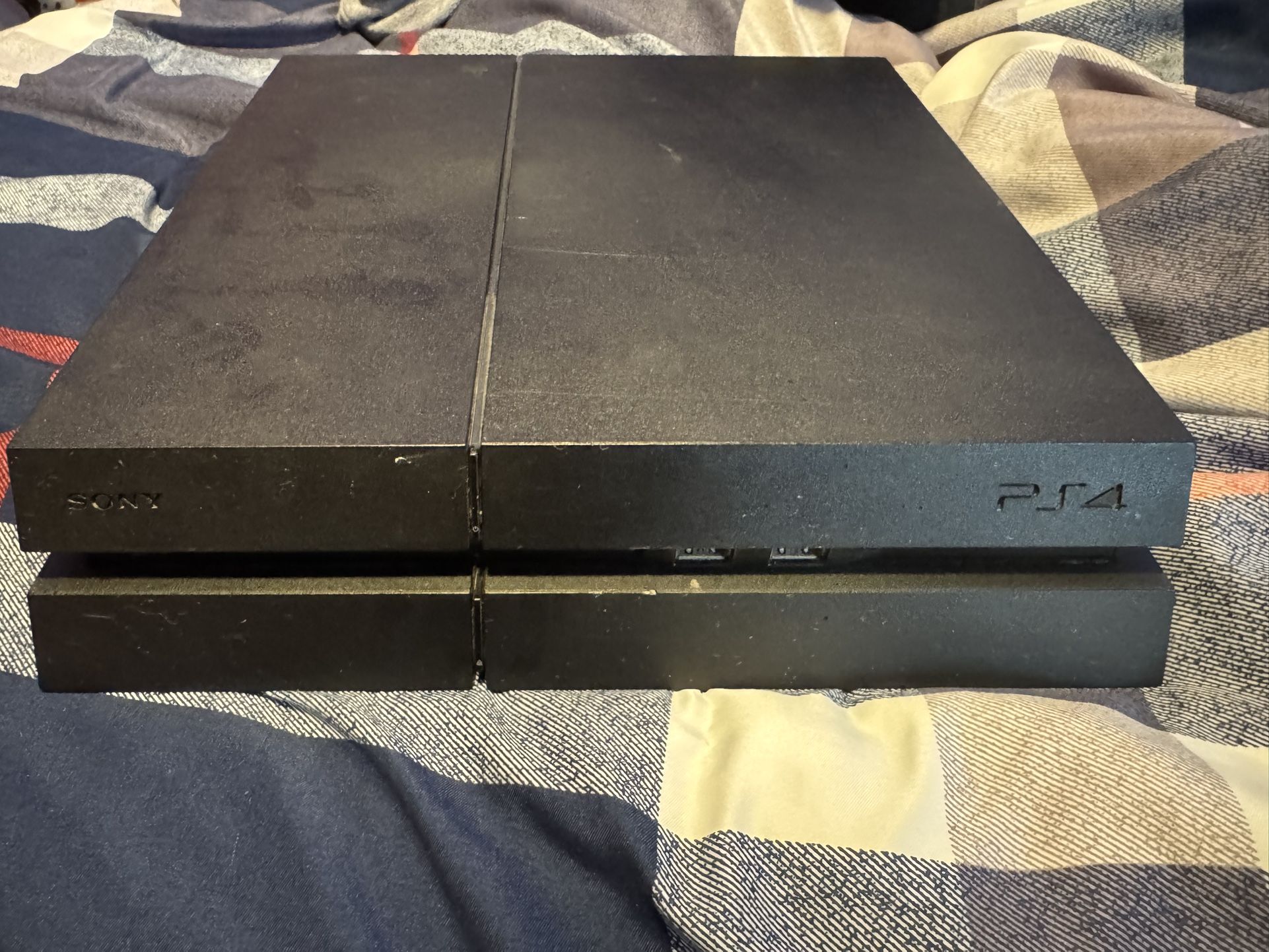PS4 Package With Dual Controller Charger And 3 Games