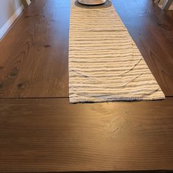 Custom dining table, table top is stained and base is painted rustic gray