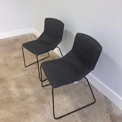 Charcoal chairs, modern minimalist vibe