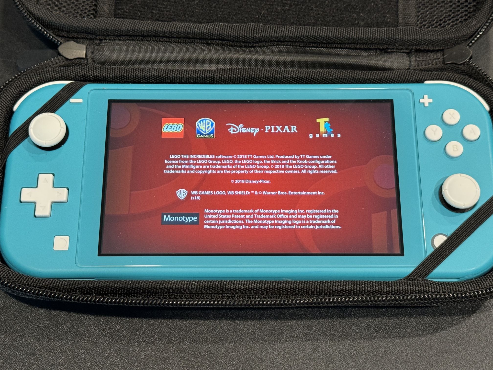 Nintendo Switch Lite Handheld Game Console with 4 games & case.