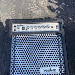 Washburn 25 watt guitar amp.  Works Good   Great Beginner Amp  