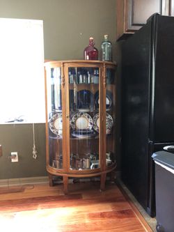 Antique oak curved glass cabinet
