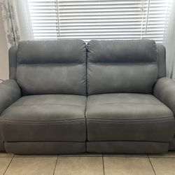 Two  New Recliner Couches 