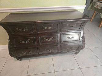 Dark Wood Bombe 9-Drawer Dresser with Carved Details