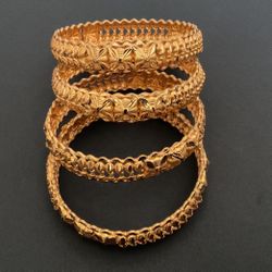 4 Gold Plated Bangle Bracelets With Designs 