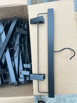 black  wood and metal trouser or skirt hanger