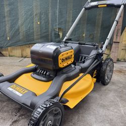 BRAND NEW IN A BOX DEWALT XR 21 INCH / 2X 20 V BRUSHLESS MAX  , PUSH LAWNMOWER INCLUDES 2  10H BATTERY AND 2 CHARGERS. UP TO 100 MIN OF RUNTIME, HIGH 