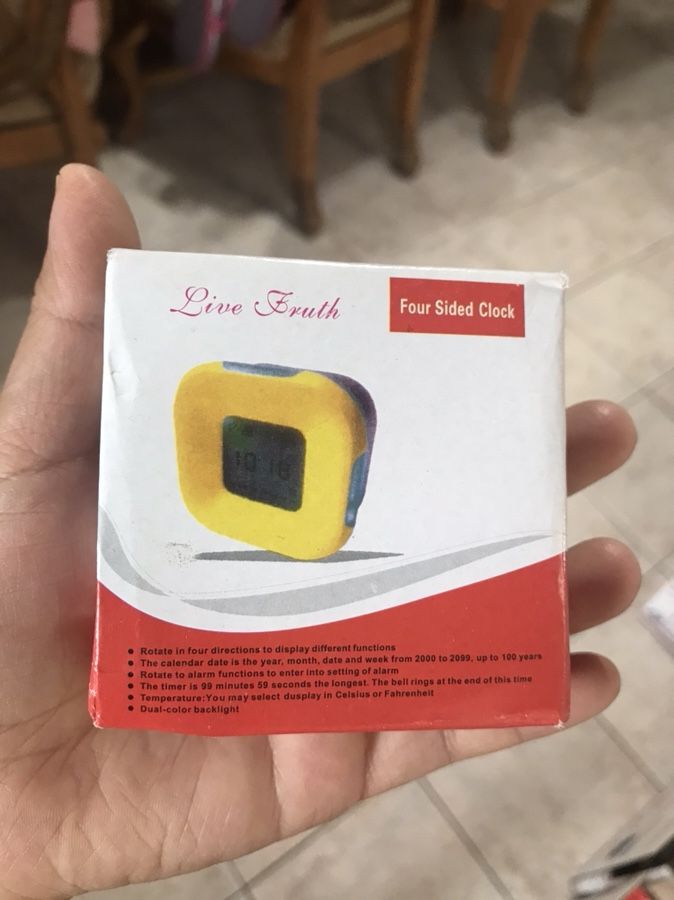Yellow Digital Four Sided Clock with Timer, Thermometer, and Alarm on a LED Display Dual Color Backlight