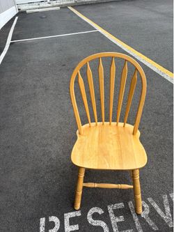 yellow solid wood chair