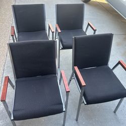 Stacking arm chairs
