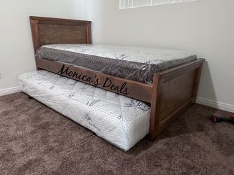 Twin Solid Wood Bed With Twin Roll Out Mattress $540